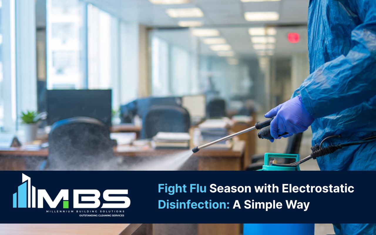 Electrostatic disinfection flu season service spraying high-touch points in an office